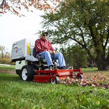 Professional bagging fall leaves and debris with a Exmark Navigator Professional Grade zero-turn mower 